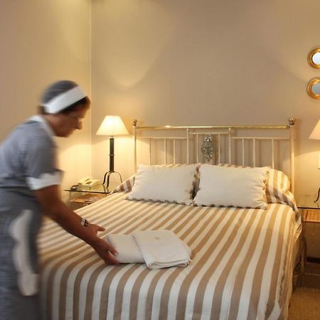 Hotel Boutique Casagrande Пайсанду Номер фото