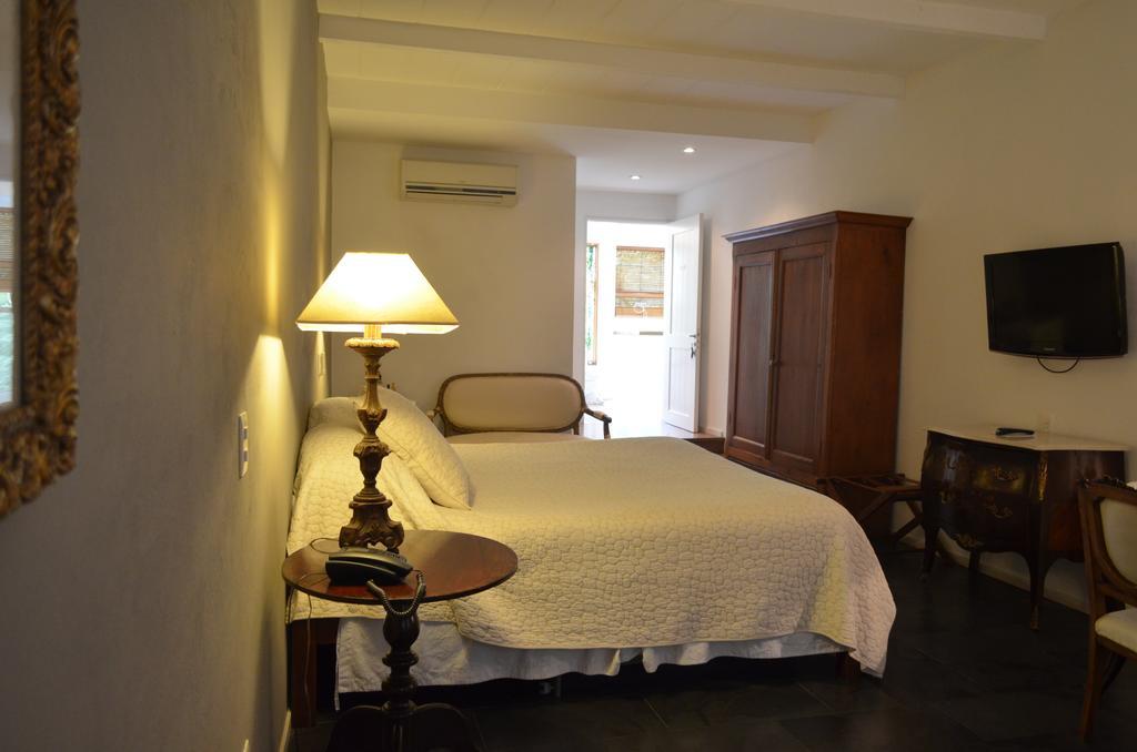 Hotel Boutique Casagrande Пайсанду Номер фото